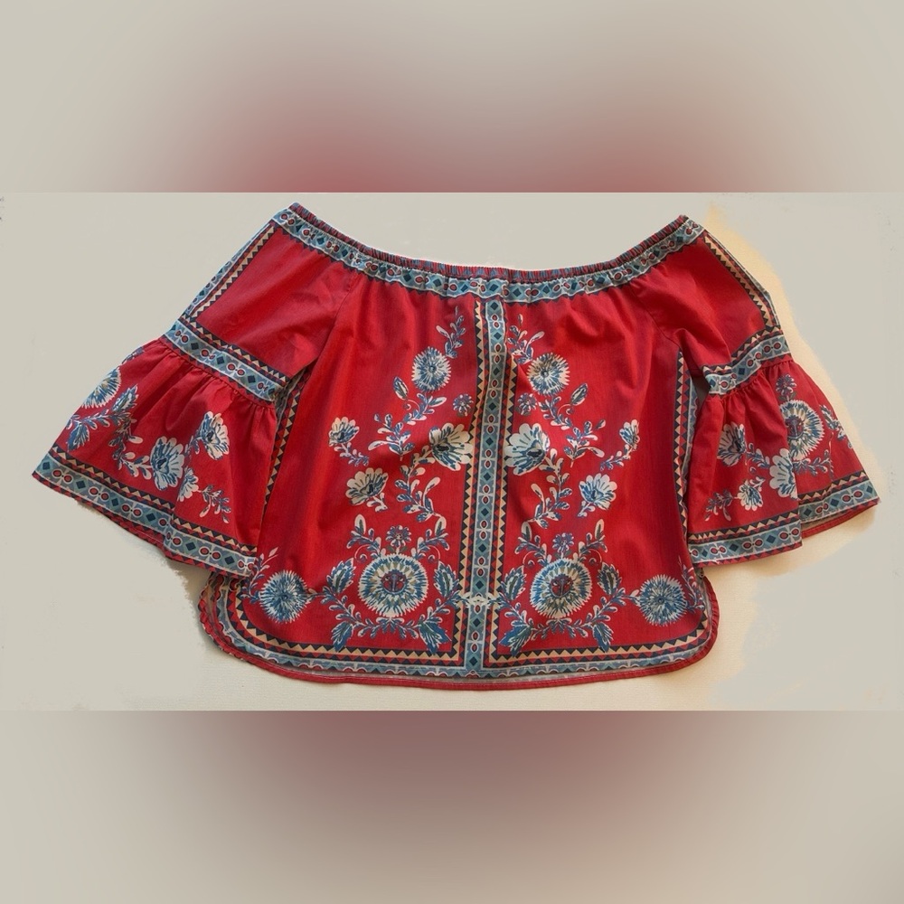 Women’s of folk-style blouse, also known as a peasant blouse.